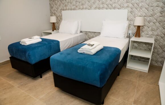 Quarto Duplo
